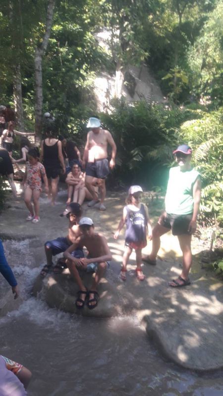 Visitors resting on the rocks mid-climb - lifeonwheel.com