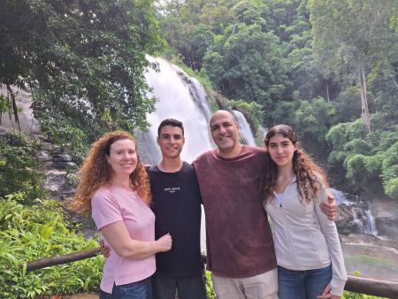 Family photo at the base of Wachirathan Waterfall - lifeonwheel.com