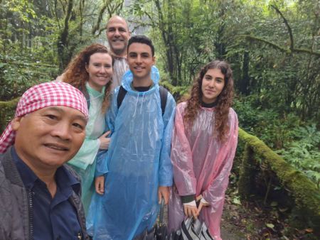 Our guide with the family on the misty summit trail - lifeonwheel.com