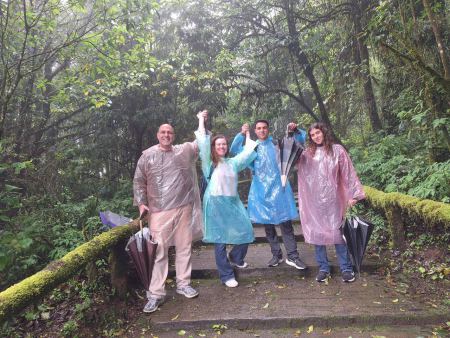 Cheering together on the stone steps in the rain - lifeonwheel.com