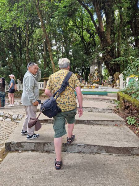 Guests walking through the temple garden path - lifeonwheel.com