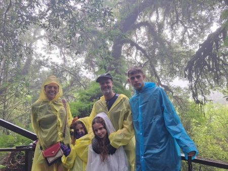 Yellow ponchos on for the family in the mist - lifeonwheel.com