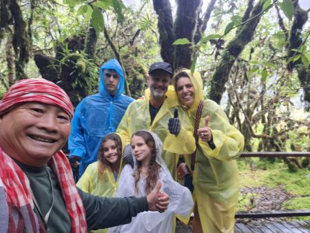 Thumbs up from the family in yellow ponchos - lifeonwheel.com