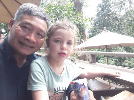 Our guide with a young guest over a drink at the cafe - lifeonwheel.com