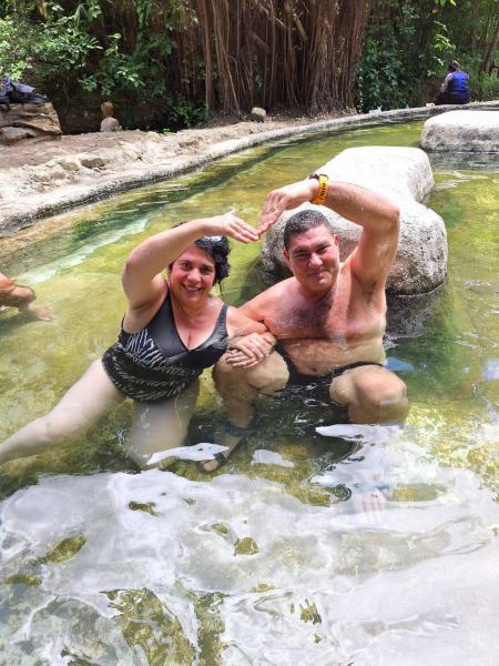 A couple enjoying the warm mineral water - lifeonwheel.com