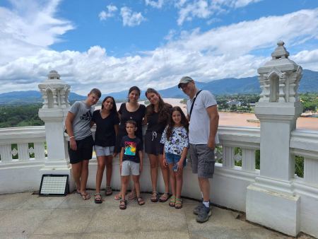 Group photo on the white balustrade over the river - lifeonwheel.com