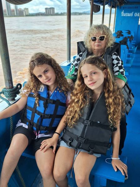 Life jackets on for the ride up the Mekong - lifeonwheel.com