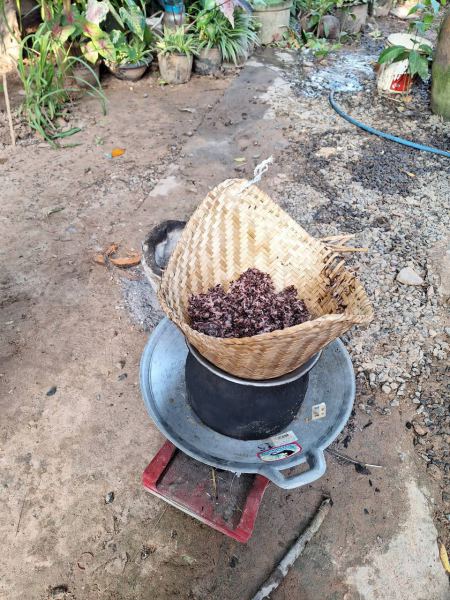 Tea leaves drying in a basket over the coals - lifeonwheel.com