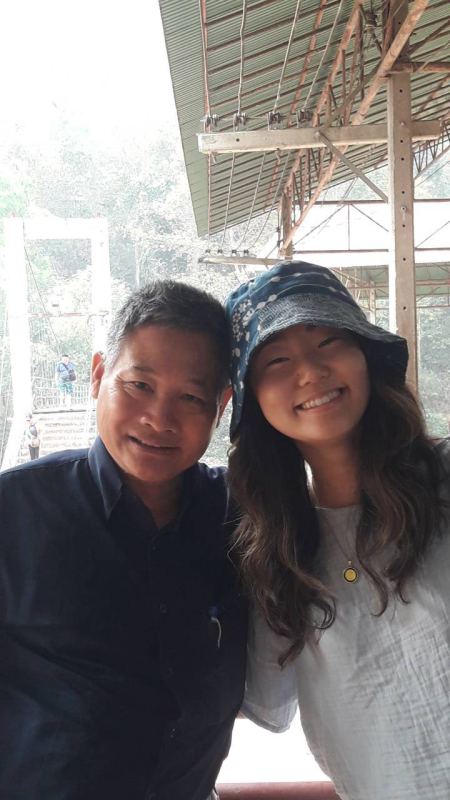 A guest in a flower hat with our guide - lifeonwheel.com