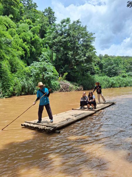 Poling the bamboo raft past the far bank - lifeonwheel.com