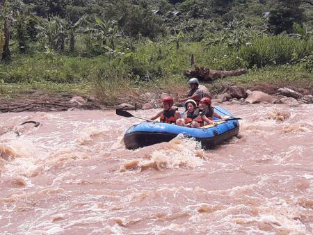 Bracing through the rapids on the swollen river - lifeonwheel.com