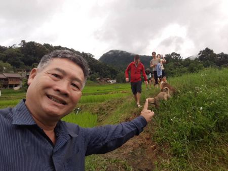 Our guide leading the way along the rice paddy trail - lifeonwheel.com