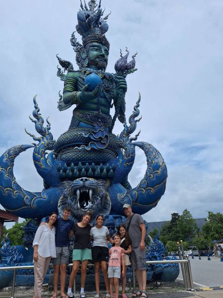 The guardian statue at the entrance to the Blue Temple - lifeonwheel.com