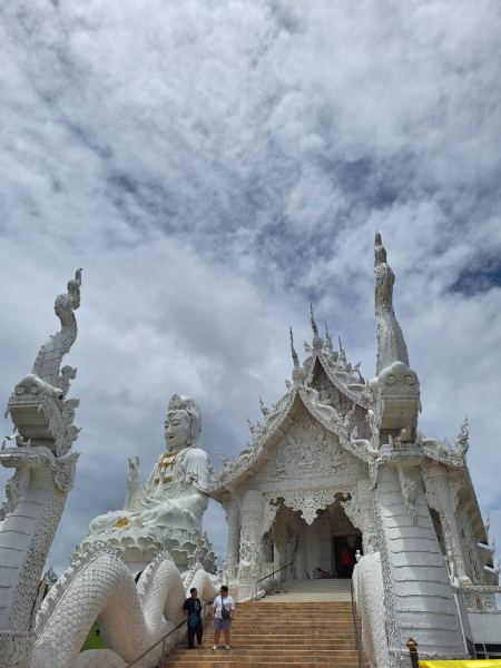 The white pagoda and naga guardians of Wat Huai Pla Kang - lifeonwheel.com