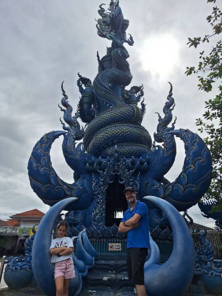 A father and daughter at the Blue Temple's naga gate - lifeonwheel.com