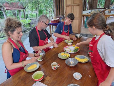 Preparing mango and sticky rice at the cooking class - lifeonwheel.com