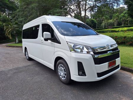 A brand new white Toyota van in the garden - lifeonwheel.com