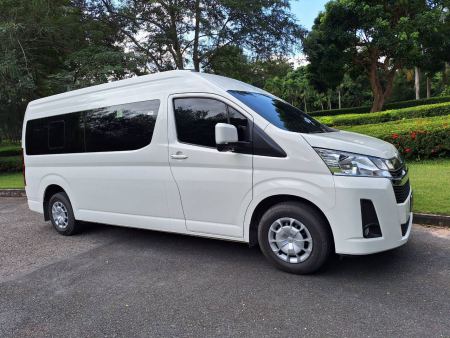 Side view of the new white Toyota van - lifeonwheel.com