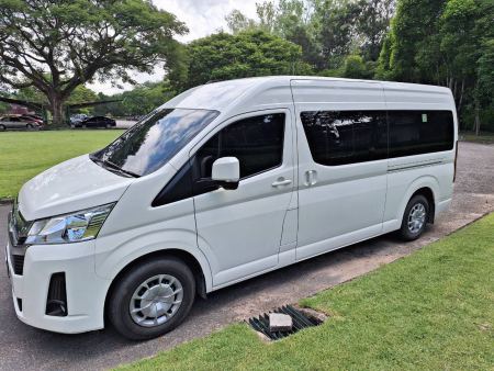 Side view of the new white van on the grass - lifeonwheel.com