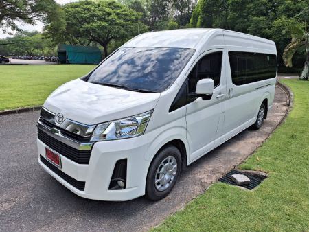 The new white Toyota van parked by the park - lifeonwheel.com