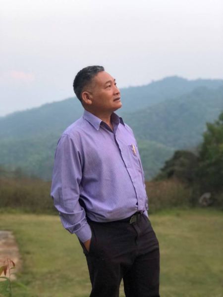 Our guide looking out over the hills at dusk - lifeonwheel.com