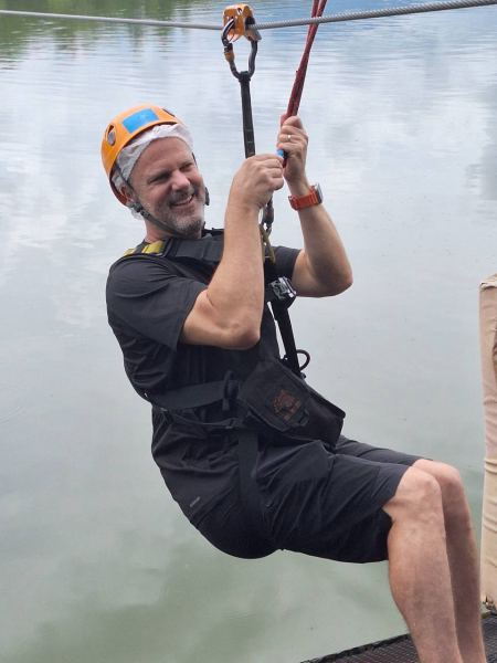 Gliding out across the lake on the zipline - lifeonwheel.com